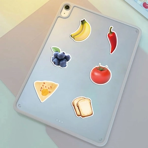 Detail showing colorful food stickers on a laptop case with 3D realistic illustration style