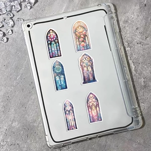 Detail of gothic stained glass window stickers on a tablet case with intricate patterns