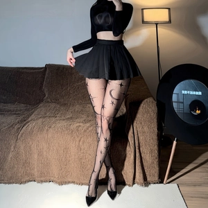 Black fishnet tights with moon and star pattern, gothic style moonlit celestial hosiery