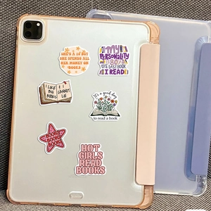 Waterproof book lover stickers applied on a transparent tablet case showing various designs
