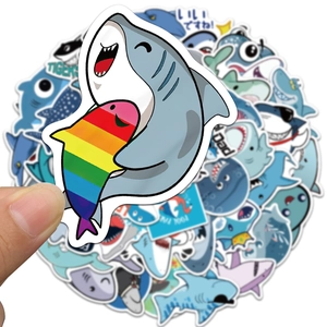 Close-up of a cartoon shark hugging a fish sticker with colorful waterproof decals