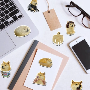 Detail of funny Doge meme stickers on laptop and notebook with waterproof PVC finish
