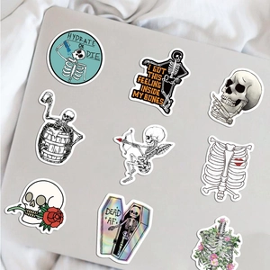 Pack of 50 waterproof cartoon skeleton stickers on laptop with assorted artistic designs