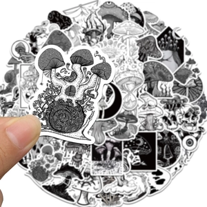 Close-up of hand-held gothic mushroom sticker from a black and white punk illustration set