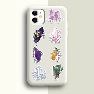 Detail of white iPhone case featuring mystic crystal and botanical waterproof stickers