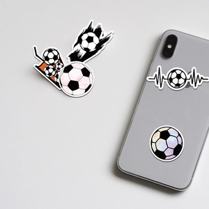 Football stickers set applied on mobile phone and scattered on flat gray background