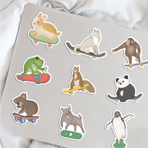 50 pack of waterproof cartoon animal skateboard stickers on a laptop surface