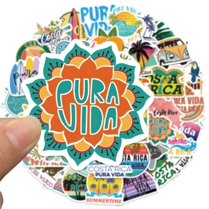Close-up of tropical Costa Rica stickers featuring Pura Vida text and floral beach motifs
