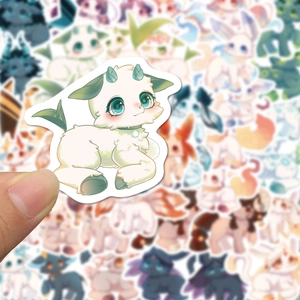 Close-up of a cute cartoon creature sticker with white die-cut border for DIY scrapbooking