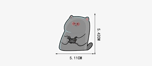 Detail showing dimensions of gray cartoon cat sticker with gaming controller and glasses