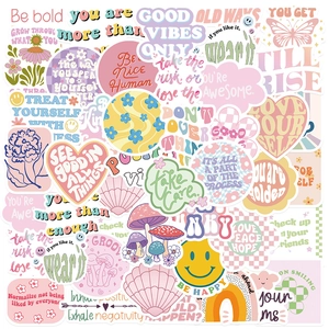 Close-up of Danish style motivational stickers with heart, flower, and mushroom designs