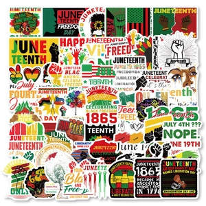 Close-up of assorted Juneteenth stickers with 1865 freedom text and cultural symbols