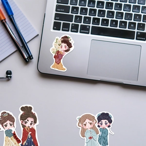 Close-up of cute traditional Hanfu girl stickers decorating a laptop and notepad