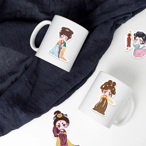 Detail of traditional Chinese hanfu girl stickers applied on white ceramic mugs