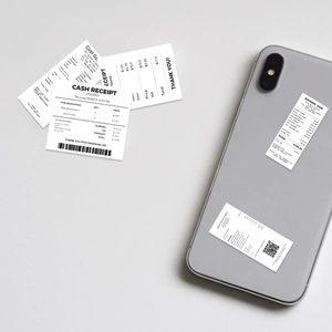 Detailed macro shot of creative receipt style PVC stickers used for phone case decoration