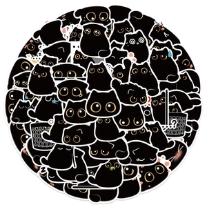 Vue macro d'un ensemble d'autocollants de chats noirs mignons disposés en forme de cercle