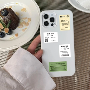 Close-up of cute white iPhone case featuring creative milk tea cup menu stickers