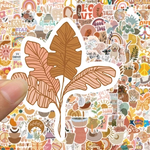 Detail of waterproof BOHO art stickers featuring palm leaf and warm earth tone patterns