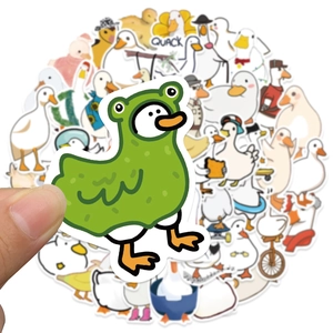 Hand holding cute waterproof duck sticker from a 50-piece cartoon animal decal set