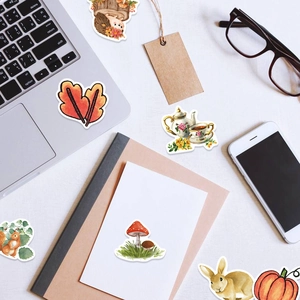 Autumn forest stickers set for laptop and phone featuring hedgehog and pumpkin motifs
