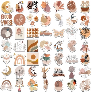 Macro view of BOHO style waterproof PVC stickers with floral and geometric sun designs