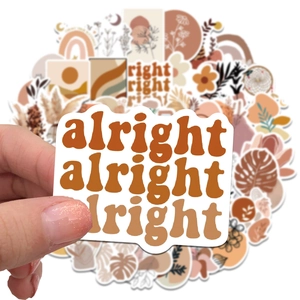 Detailed view of waterproof PVC BOHO stickers with warm earthy tones and leaf patterns