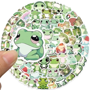 Close-up of waterproof PVC frog stickers for kids rewards and laptop decoration