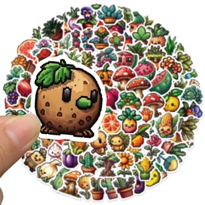 Set of 100 pixel art fruit and vegetable stickers shown being held by a hand