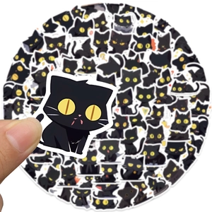 Set of 100 cartoon black cat stickers with yellow eyes for laptops and stationery