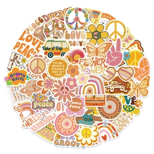 Detailed close-up of 70s retro BOHO stickers with peace signs and rainbows on white background