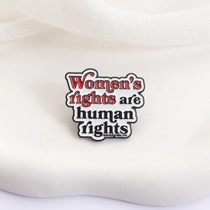 Creative minimalist enamel brooch with 'Women's rights are human rights' lettering