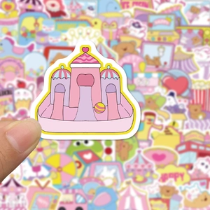 Close-up of a pink cartoon castle sticker with blue roof and cute heart decorations