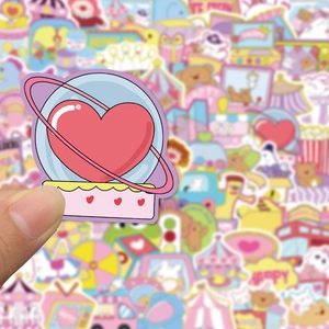 Macro shot of a cartoon crystal ball heart sticker for scrapbooking and decoration
