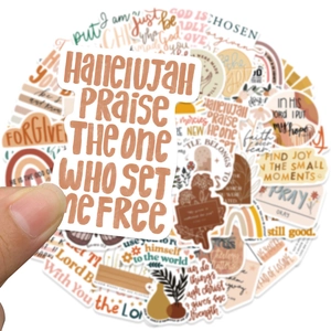 Detail of waterproof BOHO art sticker held by hand showing matte texture and warm earthy tones