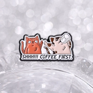 Creative enamel cat pin featuring a ginger cat and calico cat drinking coffee