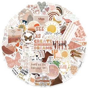 Close-up of waterproof BOHO style PVC stickers featuring inspirational quotes and art