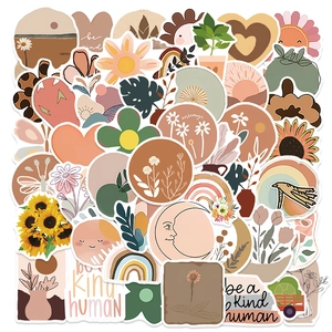 Detail of waterproof BOHO art stickers featuring suns and plants in earth tones