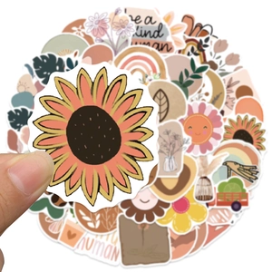 Detail of waterproof BOHO art stickers featuring sunflowers and rainbow designs