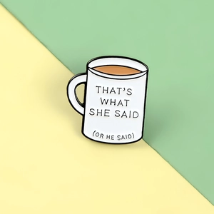 Detail of coffee cup enamel pin featuring That's What She Said humorous quote
