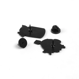 Matte black alloy pin badges showing needle pins and butterfly clutch backings