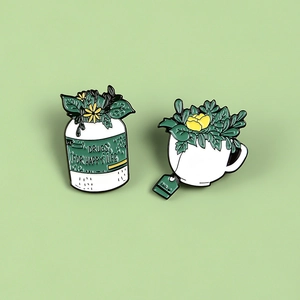 Enamel lapel pins set featuring happy life medicine bottle and potted tea cup design