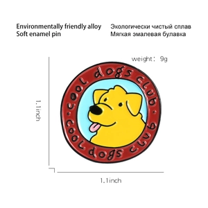 Detailed macro view of enamel pin showing yellow cartoon dog and Cool Dogs Club text