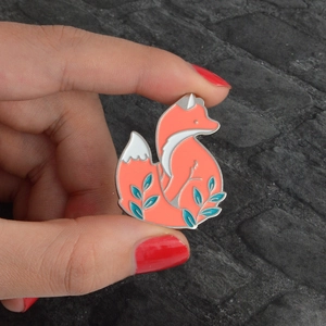 Cute cartoon red fox enamel brooch pin with orange finish and floral details for bags