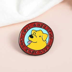 Detailed close-up of a round Cool Dogs Club enamel pin with a cute yellow cartoon dog