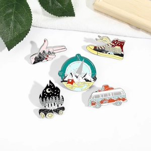 Five-piece outdoor camping enamel pins set featuring mountain scenery and vintage camper van