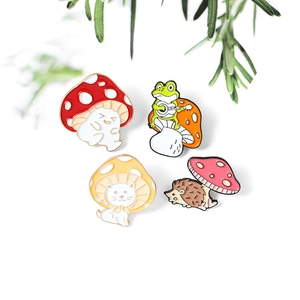 Detailed set of 4 cartoon forest enamel pins featuring cat, frog, and hedgehog on mushrooms