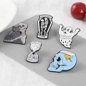 Set of 5 punk style enamel pins featuring skeletons, cats, and ghosts on white display