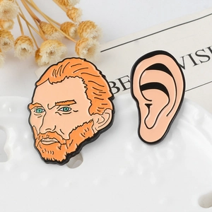Vincent Van Gogh enamel pin set with portrait and ear design on white tray