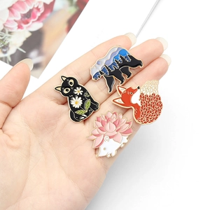 Set of 4 Japanese cartoon enamel pins featuring cat, polar bear, fox and hedgehog
