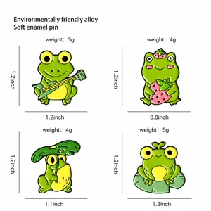 Size chart for cute strawberry and guitar frog enamel pins with alloy dimensions